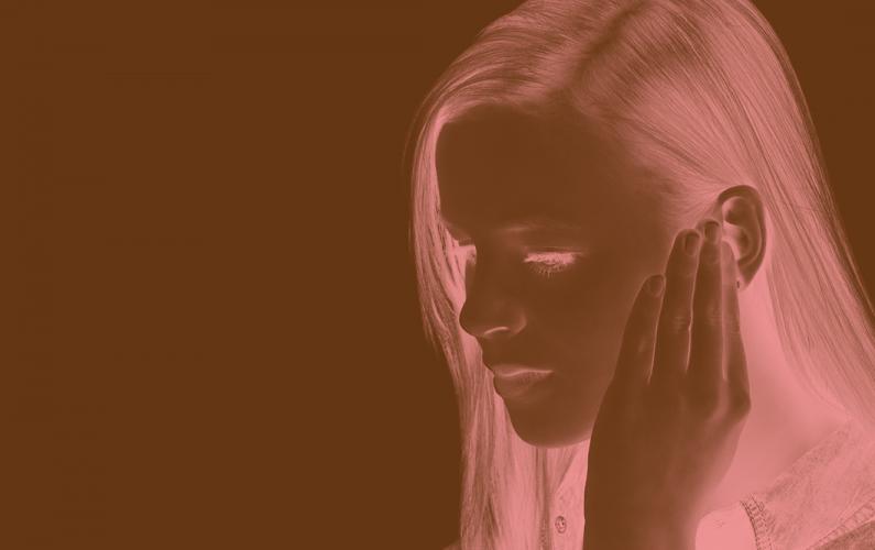 Photo negative of girl who is hard of hearing