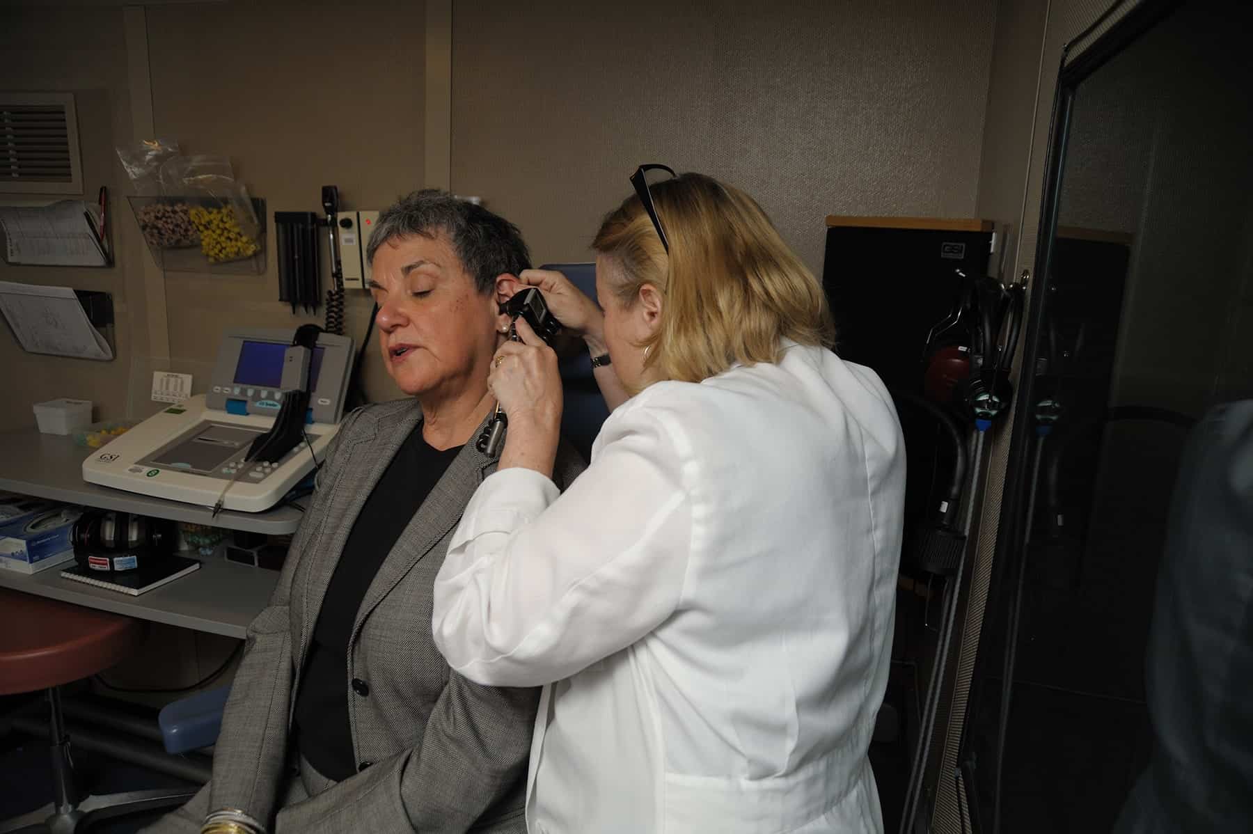 Audiologist-Performing-Hearing-Exam-on-Older-Female-Patient-NIDCD-2021-05 Audiologist Performing Hearing Exam on Older Female Patient