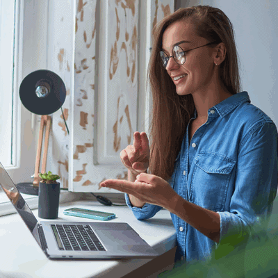 happy-young-smiling-casual-woman-learning-communicates-sign-language-online-laptop-cozy-comfy-home-by-window happy-young-smiling-casual-woman-learning-communicates-sign-language-online-laptop-cozy-comfy-home-by-window