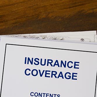 Insurance,Coverage,Abstract,With,Blueprints,And,Coffee. Insurance coverage image